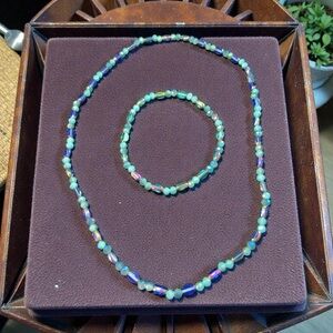 Iridescent blue and copper rice bead necklace and bracelet
